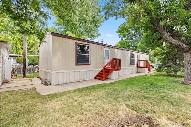 715 E Chester St, Lafayette, CO 80026 - manufactured / mobile home featuring a front yard