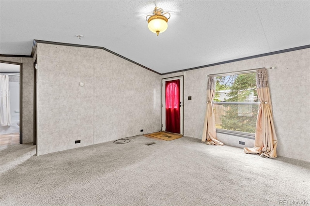 715 E Chester St, Lafayette, CO 80026 - carpeted entryway with crown molding, lofted ceiling, and a textured ceiling