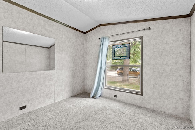 715 E Chester St, Lafayette, CO 80026 - spare room featuring crown molding, vaulted ceiling, carpet floors, and a textured ceiling