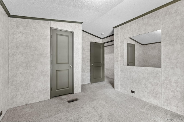 715 E Chester St, Lafayette, CO 80026 - spare room with ornamental molding, carpet, and a textured ceiling