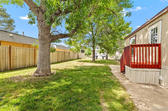 715 E Chester St, Lafayette, CO 80026 - fenced backyard with a wooden deck