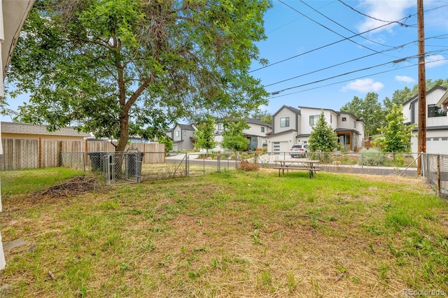 715 E Chester St, Lafayette, CO 80026 - fenced backyard featuring a residential view