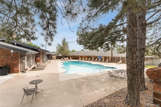 6495 E Happy Canyon Rd Unit 158, Denver, CO 80237 - community pool featuring a patio