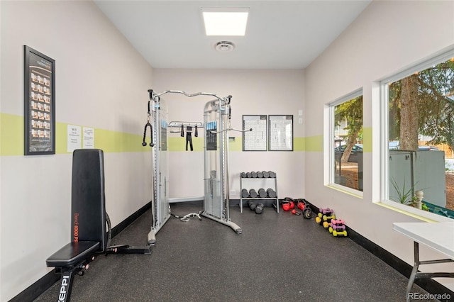 6495 E Happy Canyon Rd Unit 158, Denver, CO 80237 - workout area with baseboards