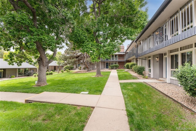 6495 E Happy Canyon Rd Unit 158, Denver, CO 80237 - view of home's community with a lawn