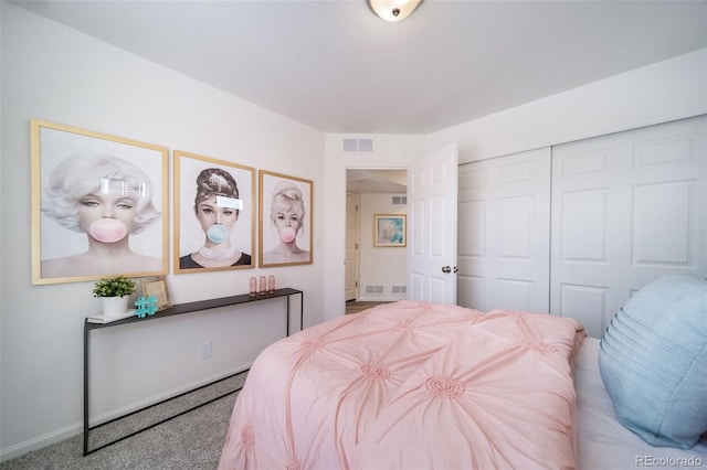 bedroom with a closet and carpet flooring