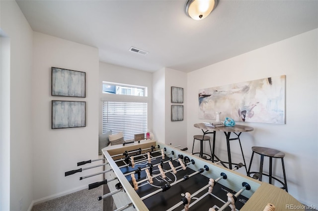 recreation room featuring carpet flooring