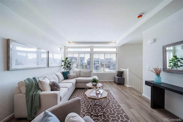 living room with light hardwood / wood-style floors