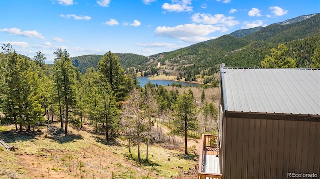 161 Highland Cir, Rye, CO 81069 - view of mountain backdrop with a forest and a nearby body of water