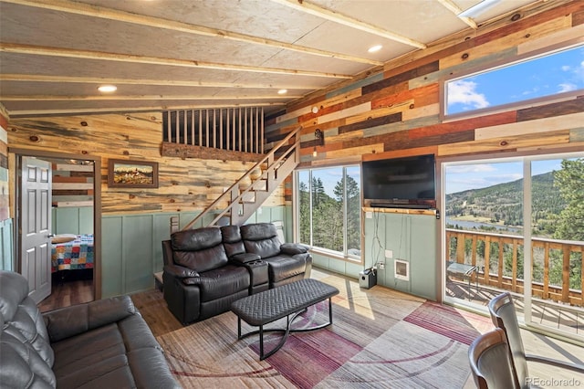 161 Highland Cir, Rye, CO 81069 - living room with wooden walls, healthy amount of natural light, stairs, recessed lighting, and wood finished floors
