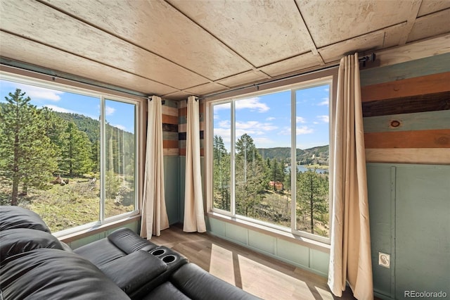 161 Highland Cir, Rye, CO 81069 - sunroom / solarium with a mountain view and a wooded view