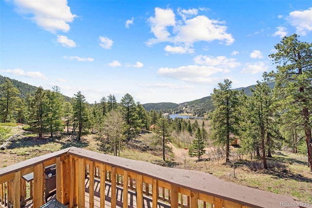 161 Highland Cir, Rye, CO 81069 - view of mountain background with a heavily wooded area and a large body of water