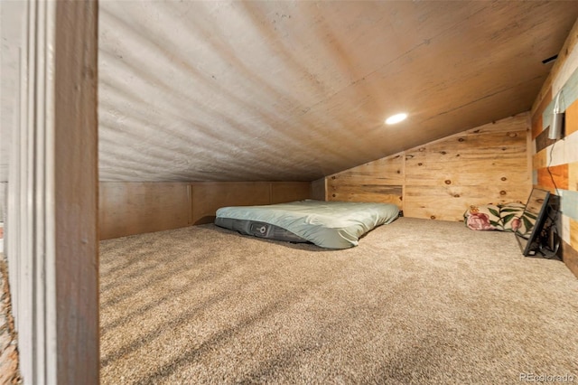 161 Highland Cir, Rye, CO 81069 - unfurnished bedroom with vaulted ceiling, wooden walls, carpet, and wood ceiling