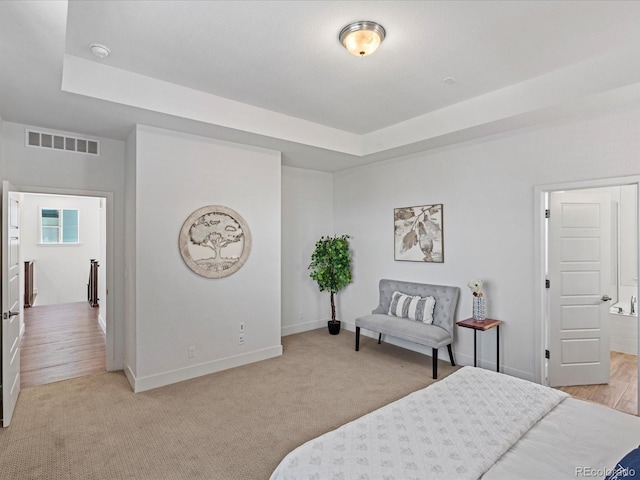 10235 E 59th Ave, Denver, CO 80238 - bedroom with a raised ceiling and carpet