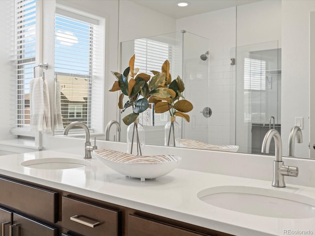 10235 E 59th Ave, Denver, CO 80238 - bathroom with double vanity and a tile shower