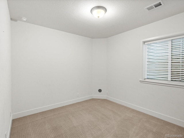 10235 E 59th Ave, Denver, CO 80238 - empty room featuring carpet flooring and a smoke detector