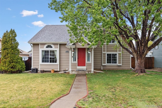 21125 E 43rd Ave, Denver, CO 80249 - view of front of property featuring roof with shingles and central AC unit