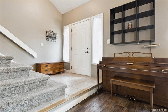 21125 E 43rd Ave, Denver, CO 80249 - entrance foyer featuring stairs and wood finished floors