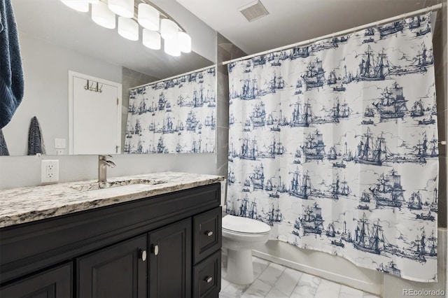 21125 E 43rd Ave, Denver, CO 80249 - full bath with marble look tile flooring, vanity, toilet, and shower / tub combo