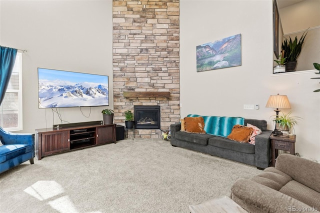 7018 E 123rd Pl, Thornton, CO 80602 - living area with light colored carpet, a fireplace, and a towering ceiling