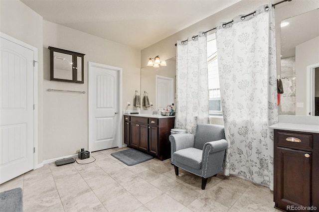 7018 E 123rd Pl, Thornton, CO 80602 - bathroom featuring vanity, tile patterned floors, and a shower with curtain