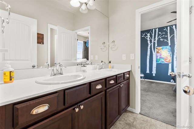 7018 E 123rd Pl, Thornton, CO 80602 - full bath with double vanity and tile patterned flooring