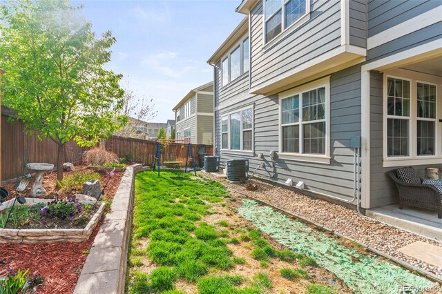7018 E 123rd Pl, Thornton, CO 80602 - fenced backyard with central AC unit