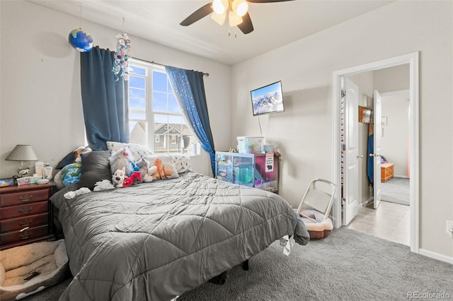 7018 E 123rd Pl, Thornton, CO 80602 - carpeted bedroom with ceiling fan and baseboards