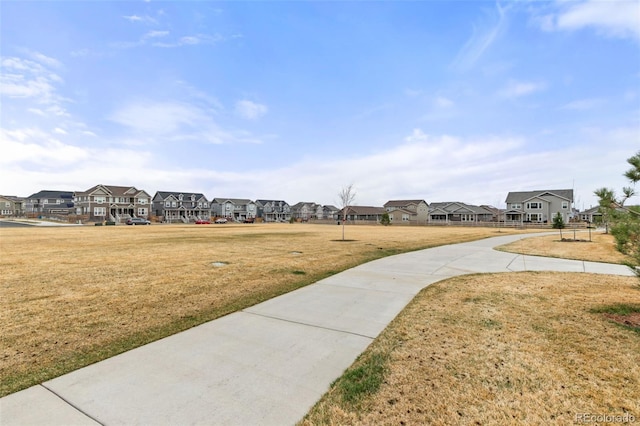 view of yard featuring a residential view