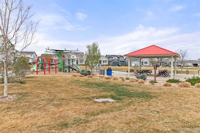 community play area with cooling unit, a residential view, a gazebo, and a lawn
