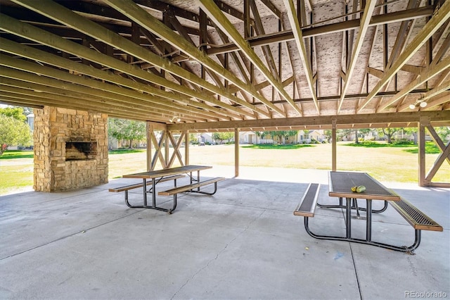 view of community featuring a yard and a patio