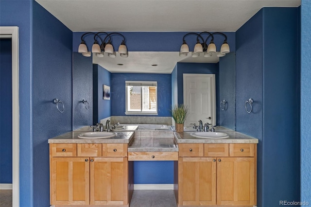 full bath with a sink, tile patterned flooring, and double vanity