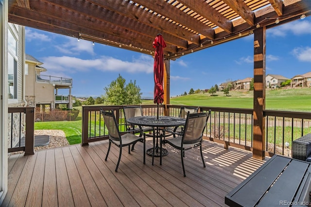 deck featuring a residential view, a pergola, view of golf course, outdoor dining area, and a yard