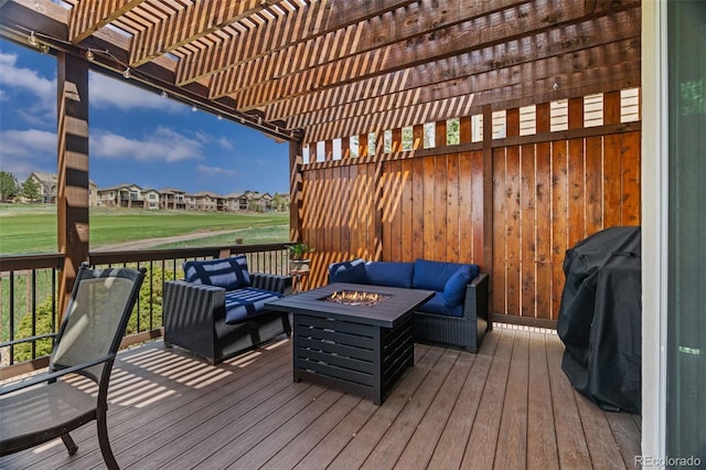 deck featuring grilling area, a pergola, a residential view, and an outdoor living space with a fire pit