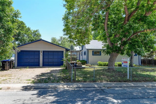 6788 Pierce Way, Arvada, CO 80003 - view of front of home with a garage and an outdoor structure