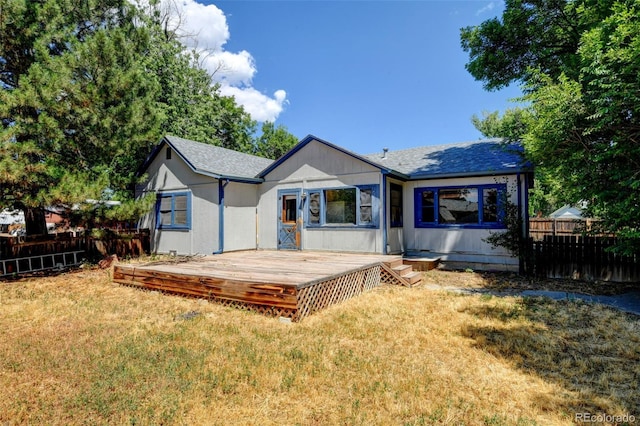 6788 Pierce Way, Arvada, CO 80003 - back of house featuring a wooden deck