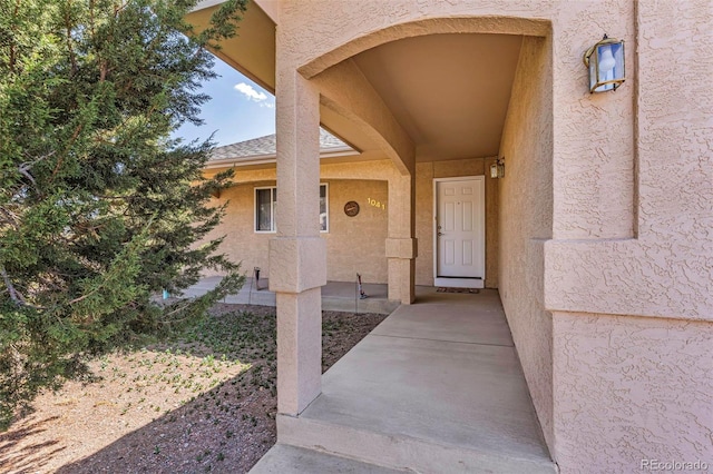 1041 Rockafellow Ct, Canon City, CO 81212 - doorway to property featuring stucco siding