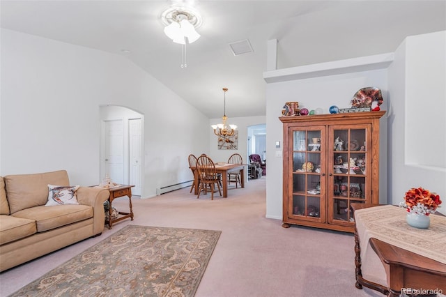 1041 Rockafellow Ct, Canon City, CO 81212 - living area with light carpet, baseboard heating, arched walkways, a chandelier, and lofted ceiling