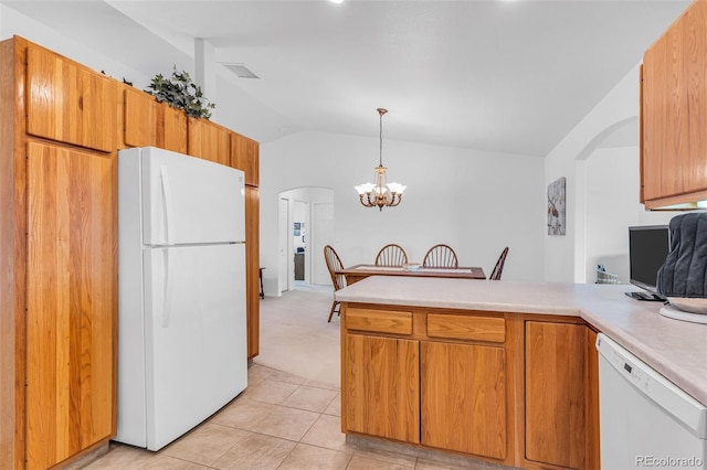 1041 Rockafellow Ct, Canon City, CO 81212 - kitchen featuring light countertops, a peninsula, lofted ceiling, white appliances, and light tile patterned flooring