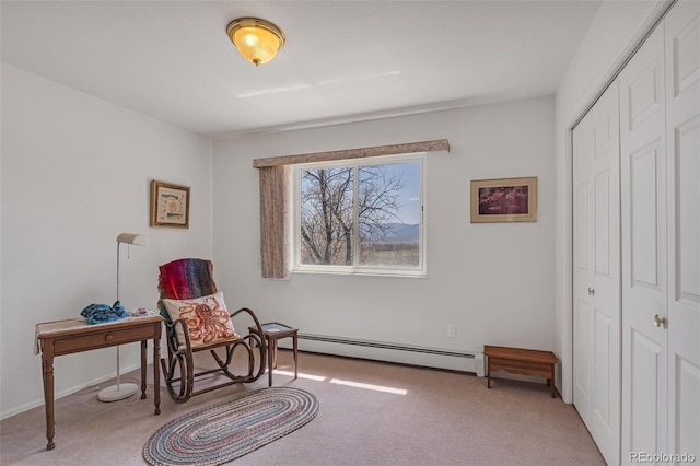 1041 Rockafellow Ct, Canon City, CO 81212 - living area featuring light colored carpet, a baseboard radiator, and baseboards