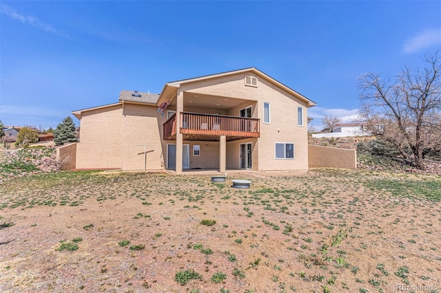 1041 Rockafellow Ct, Canon City, CO 81212 - rear view of house featuring stucco siding and a patio area