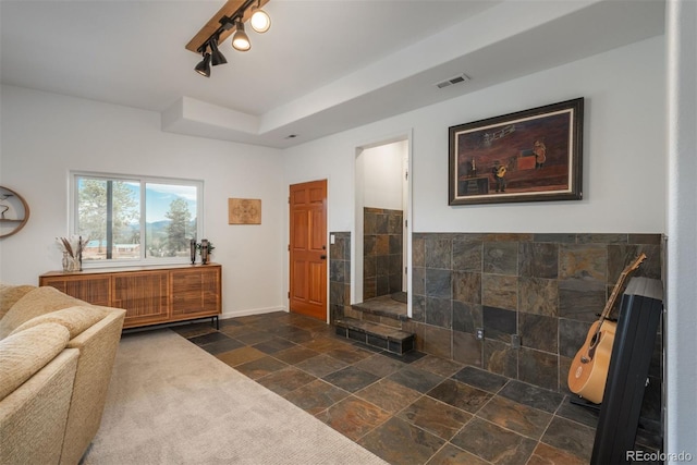 28364 Tresine Dr, Evergreen, CO 80439 - full bath featuring stone tile floors and vanity