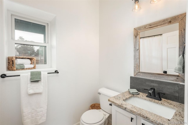 28364 Tresine Dr, Evergreen, CO 80439 - bathroom with vanity and tasteful backsplash