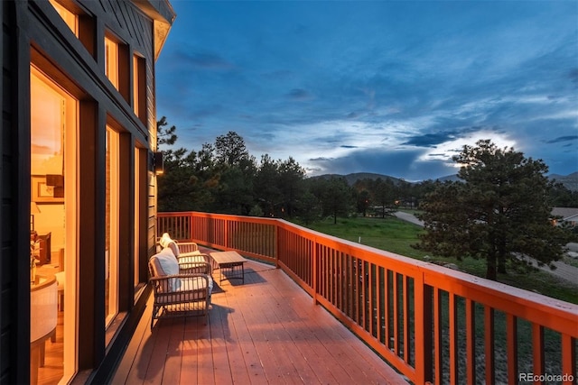 28364 Tresine Dr, Evergreen, CO 80439 - wooden deck with a mountain view