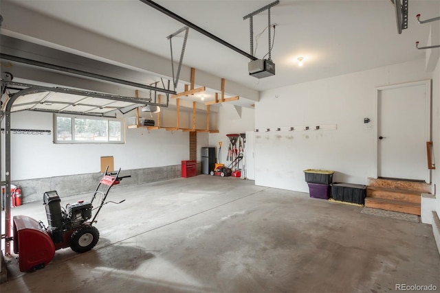 28364 Tresine Dr, Evergreen, CO 80439 - garage featuring a garage door opener