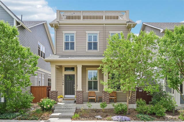 11346 E 27th Ave, Denver, CO 80238 - view of front of home with a porch and fence