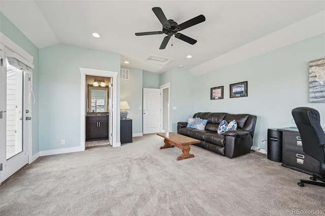 11346 E 27th Ave, Denver, CO 80238 - living room featuring carpet floors, vaulted ceiling, ceiling fan, baseboards, and a desk
