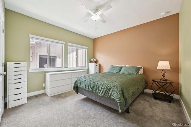 11346 E 27th Ave, Denver, CO 80238 - carpeted bedroom with baseboards and ceiling fan