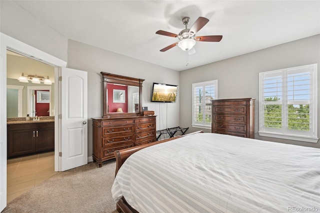 11346 E 27th Ave, Denver, CO 80238 - bedroom with ensuite bathroom, a ceiling fan, and light tile patterned floors