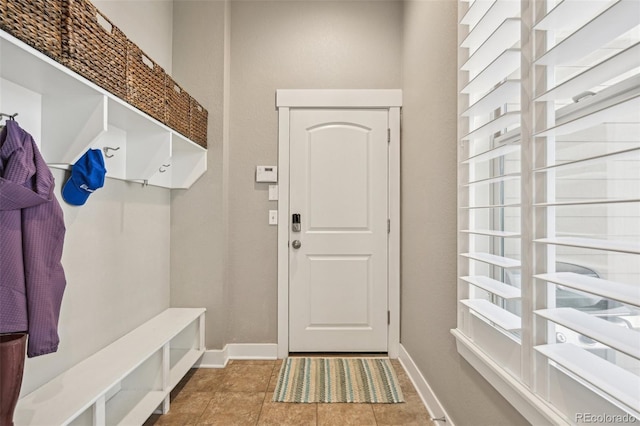 11346 E 27th Ave, Denver, CO 80238 - mudroom with baseboards and tile patterned floors